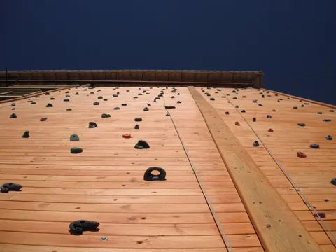 looking up at a climbing wall